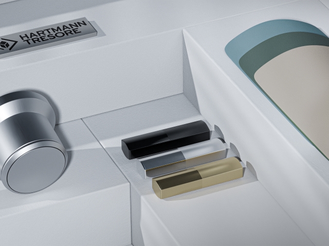 verschiedene-Materialproben-wie-Farbfaecher-oder-das-Hartmann-Logo-liegen-als-Materialmoodboard-zusammen